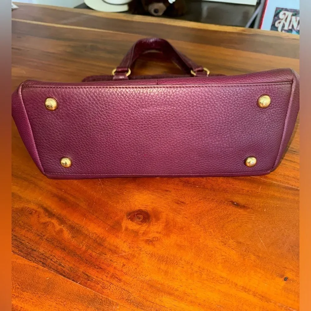 Issac Mizrahi leather handbag with large faux croc pocket.   Magnetic closure